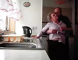Grandma together with grandpa shafting in an obstacle kitchen